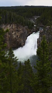 Upper Falls of Yellowstone River in the Grand Canyon of Yellowstone National Park, summer vacation destination for outdoor nature recreation
