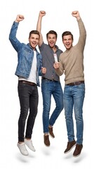 Obraz premium Group of three excited young men jumping together with raised hands in victory celebration isolated on white background.