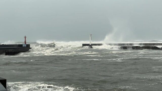 Storm Waves From Approaching Hurricane Crash Into Sea Wall