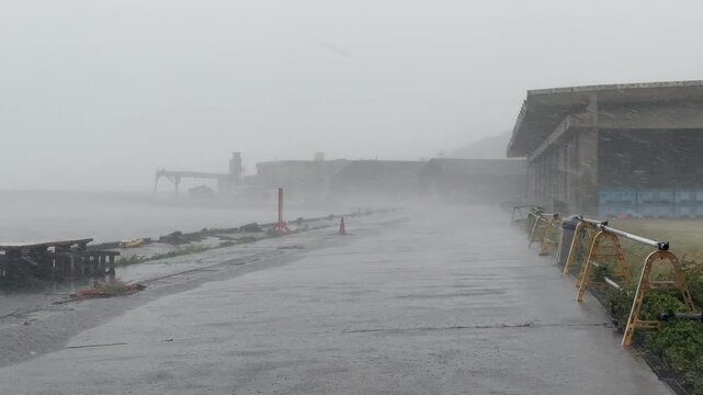 Hurricane Wind And Heavy Rain Lash Port Buildings