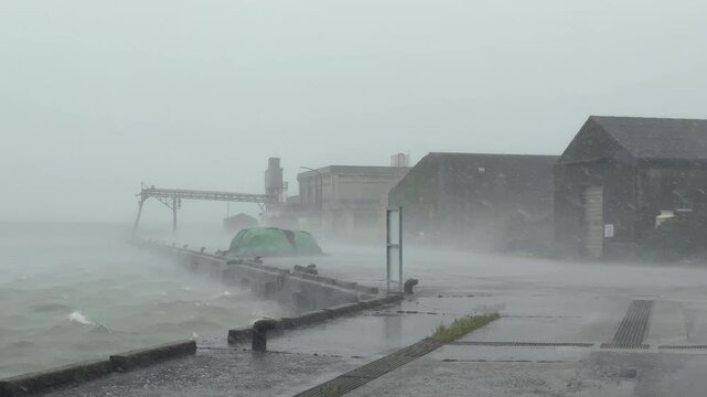 Powerful Hurricane Winds And Torrential Rain Batter Port Buildings