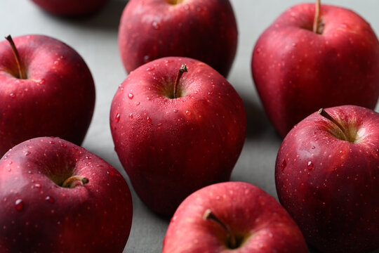 Fresh red apples fruit (Red Delicious) on cotton fabric background