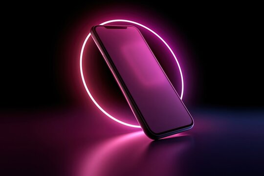 Smartphone illuminated by neon ring on dark background