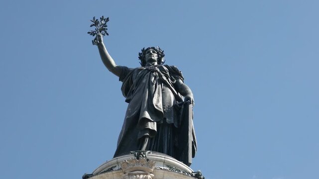 Marianne statue on Place de la Republique symbolizing the French Republic, liberty, and democracy