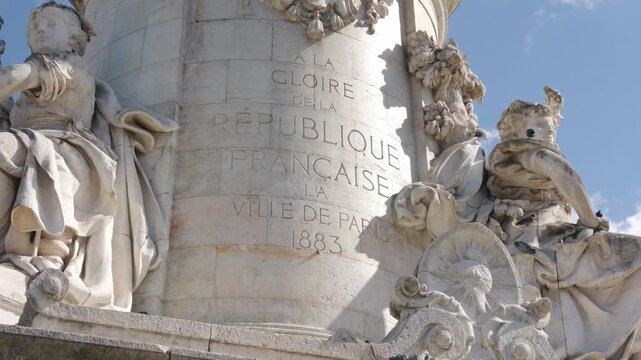 Monument a la Republique sculptures displaying an inscription A la Gloire de la Republique Francaise