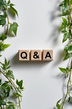 Q&A wooden letter blocks surrounded by green ivy