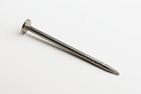Closeup of a single galvanized metal nail on