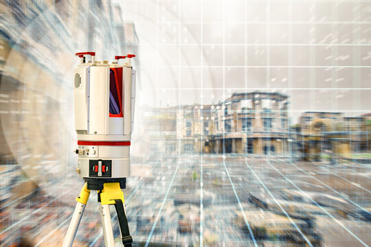 Construction surveying. Laser scanner captures 3D measurements at a building site, supporting digital mapping, BIM modeling, engineering surveys and construction planning.