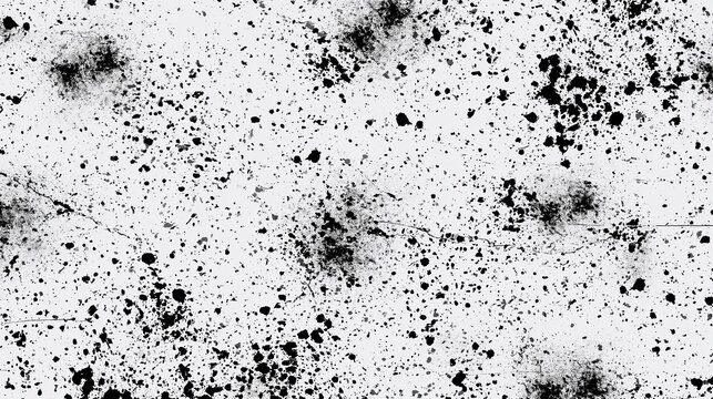 Abstract black ink splatter pattern on white background