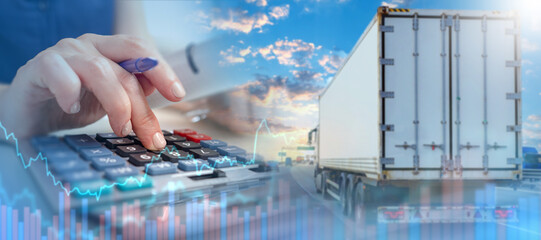 Obraz premium Freight transportation. Logistics finance. Specialist calculates transportation costs and analyzes shipping expenses, freight rates and commercial logistics performance.