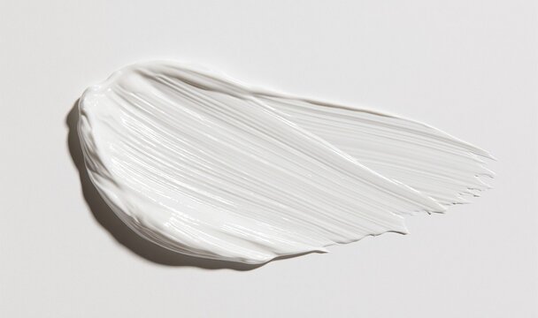 white creamy smear on light background