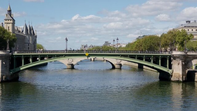 Pont au Change bridge crossing the Seine River with Conciergerie in background