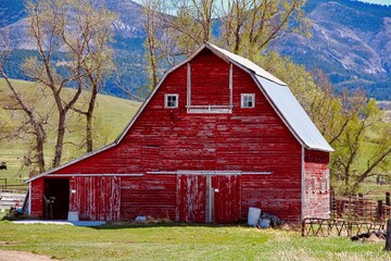 Beautiful Iconic Vintage Red Barn in the Countryside of Central Montana. © LMSwanson