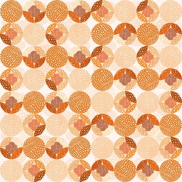 Orange abstract seamless pattern with textured dotted circles