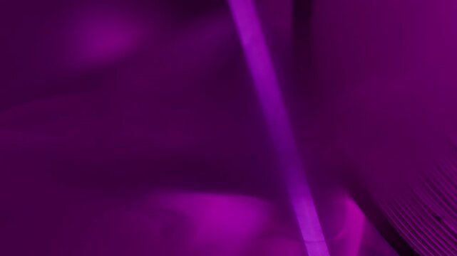 Vertical video. Neon vapor. Spill light smog. Defocused purple color bright round texture drip dazzle gleam flow on abstract art background.