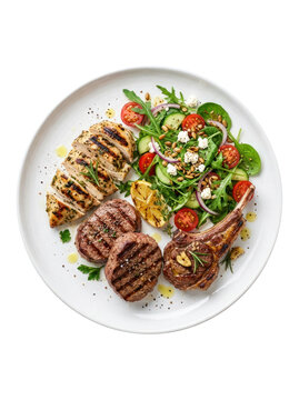 A white plate displays a grilled chicken breast, grilled lamb chops, and a beef medallion. The plate is filled with a vibrant salad featuring arugula, sliced cucumbers, cherry tomatoes