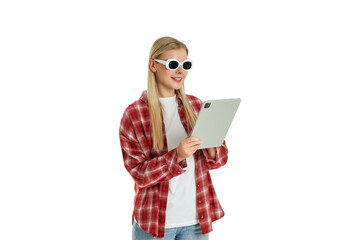 Woman engages with tablet, smiling while browsing online. Digital lifestyle concept, PNG © Atlas