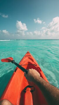 Person Kayaking in Clear Tropical Water