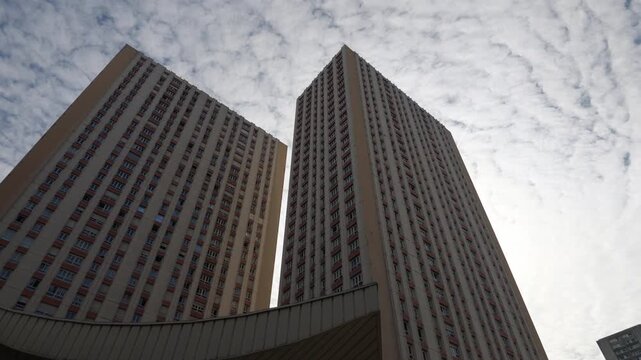 Olympiades residential towers rising into the sky, reflecting brutalist architecture and urban living