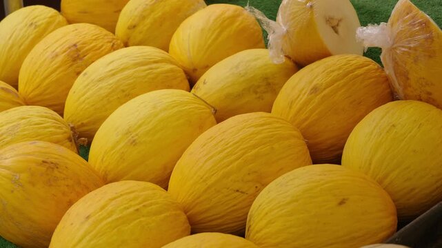 Bright yellow canary melons offering fresh fruit and healthy eating options