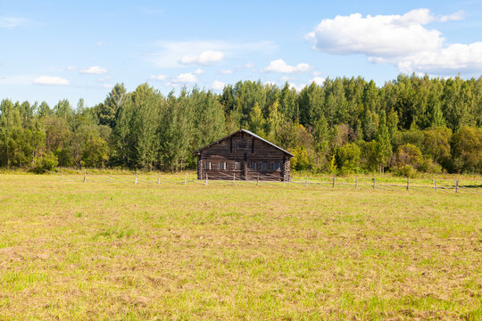 Rural Wooden Houses in Summer Countryside
