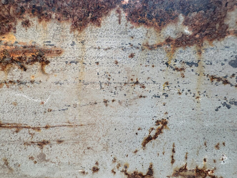 Rusty Metal Wall Texture Background with Weathered Iron Surface, Aged Brown Grunge Pattern, Rough Industrial Material and Vintage Distressed Backdrop