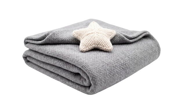 Soft gray knitted baby blanket with cream star pillow, cozy nursery textile set, folded wool throw for newborn bedding
