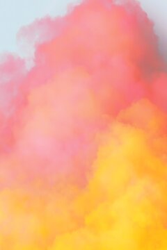 Pink and yellow color smoke background with soft blurred gradient texture