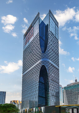 Shenzhen, China - March 29.2026: The modern Zhaoxin Building. it is a complex skyscraper with glass and steel constructure accomodating business and residential units at Huijin Square, Shenzhen, China