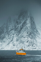 Fishing boat at Norwegian Sea at Lofoten island, Norway © Rawpixel.com