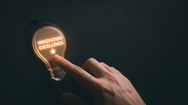 Human finger activating glowing lightbulb icon representing innovation