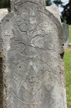 Historic Headstone With Flower and Mason Symbol in Rural East TX Cemetery