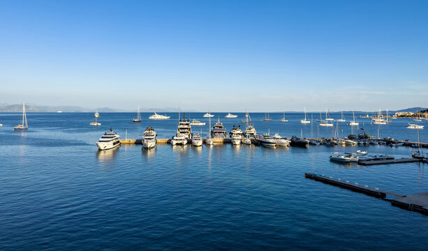 Yachts and sailboats on NAOK Marina floating docks, Corfu Town, Greece, Garitsa Bay