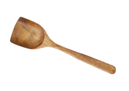 Wooden turner scoop brown kitchen tool for culinary food preparation.