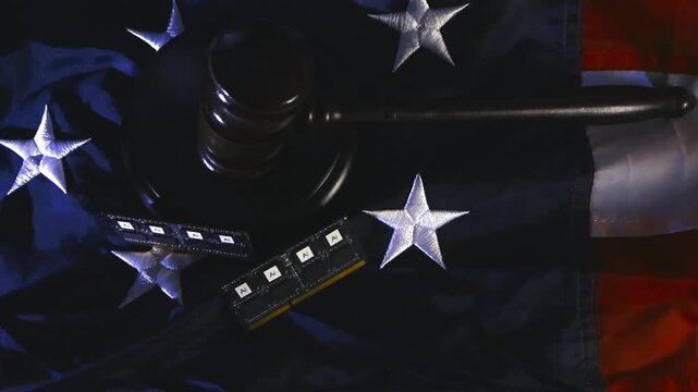 Conceptual close up of a judge's gavel and artificial intelligence microchips on a United States flag, symbolizing the regulation, ethics, and legal challenges of AI technology