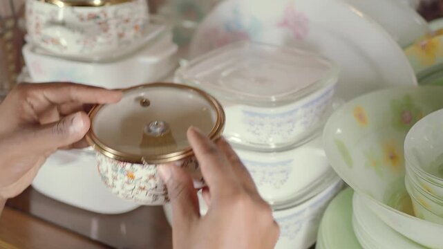 Collection of glass dishes in a display cabinet