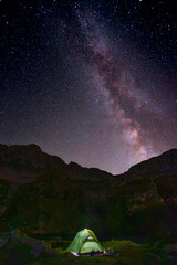 Milky Way galaxy over dark mountain ridges in Fagaras, Romania © Jan