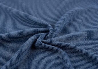 Fototapeta premium Abstract Background of Dark Blue Ribbed Fabric Texture.
