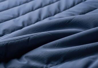 Obraz premium Close up view of navy blue quilted fabric texture.