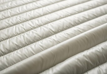 Obraz premium Soft white quilted fabric texture background close up.