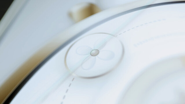 Blue ventilation fan centered on pale display