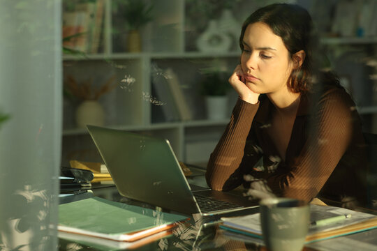 Telecommuter waiting for online result working at home
