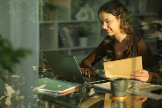 Young telecommuter working online at home