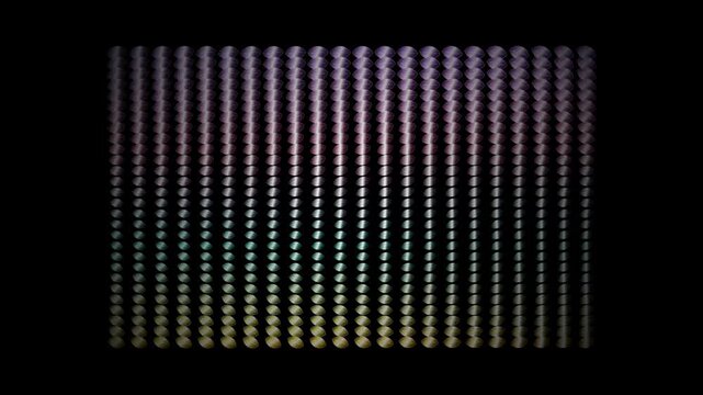Abstract pattern of glowing metallic spheres on black background
