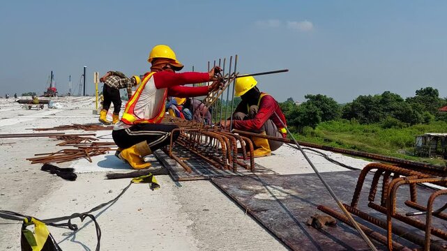 workers doing reinforcing bar  installation in a construction