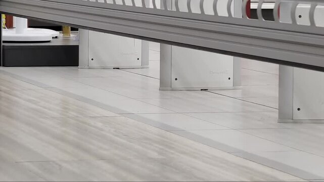 Security shutter closing electronic article surveillance gates modern retail environment, demonstrating store closing procedure asset protection technology for commercial premises