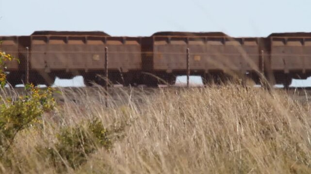 Iron Ore Train Hauling Through Pilbara, Western Australia, Industrial
