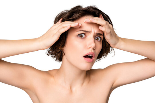 Closeup photo of beautiful naked lady bobbed hairstyle look mirror displeased touch forehead see new wrinkles spa rejuvenation not work isolated grey color background
