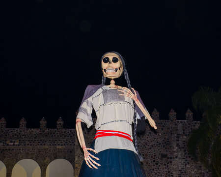 Giant Skeleton Figure Celebrating Day of the Dead at Night in Mexico