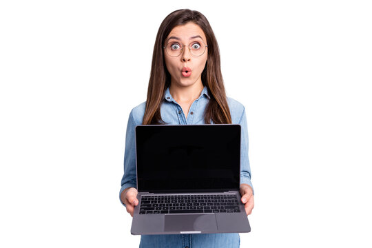 Photo of impressed cute long hairdo lady show laptop wear spectacles blue shirt isolated on grey color background